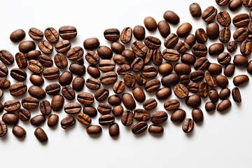 Obraz premium Scattered Coffee Beans Isolated on a White Background