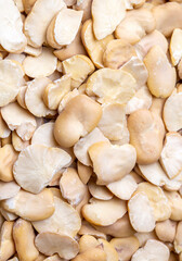 Dry broad beans on a white background