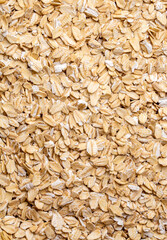 Heap of dry rolled oats isolated