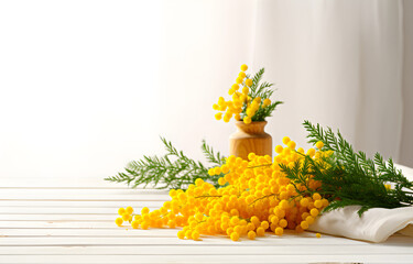 yellow mimosa herbs on white wooden table for woman day greeting card decor