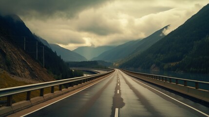 Highway on mountain road in a cloudy day.Generative AI - obrazy, fototapety, plakaty