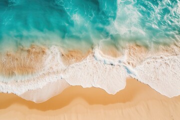 Aerial View of Turquoise Waves Crashing on Golden Sands