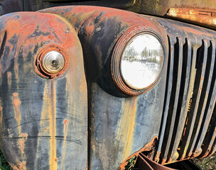 Headlights On Rusting Truck