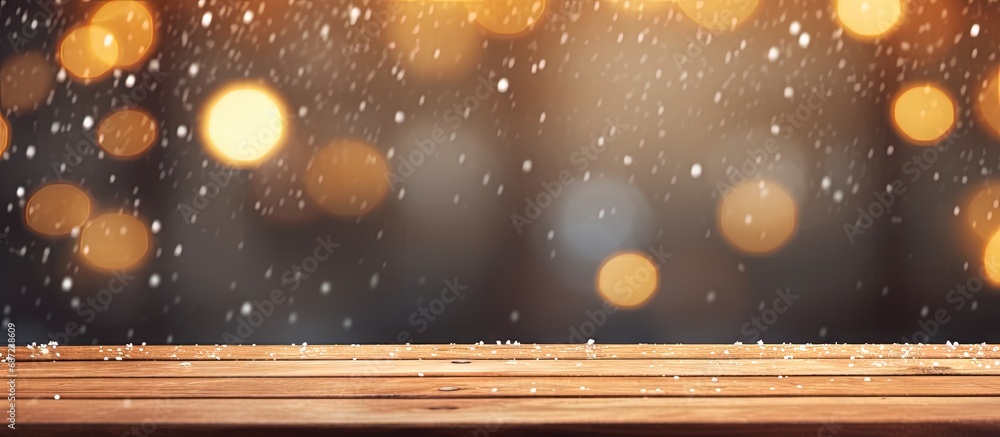 Fototapete Winter bokeh background with empty wooden table for product montage during Christmas holidays Copy space image Place for adding text or design