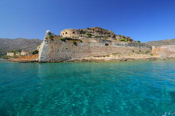 Spinalonga Island on a Beautiful sunny day showing the turqoius sea and blue sky. Crete, Greece,...