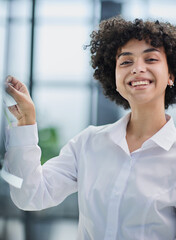 woman working on project plan using sticky papers notes on glass