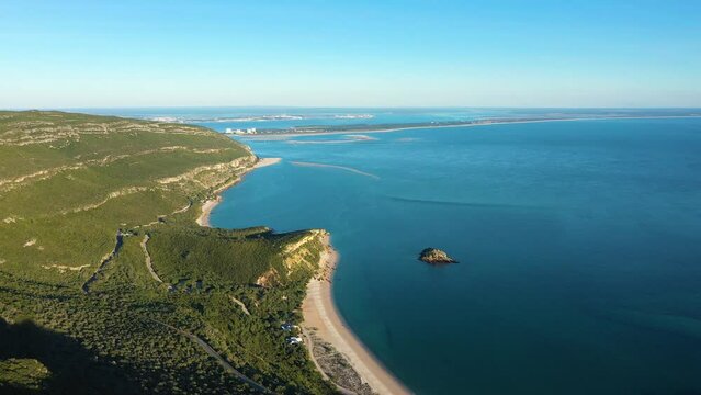 Arrabida Natural Park and Atlantic Ocean. Green Hills and Beaches. Troia Peninsula. Portugal. Aerial View. Drone Moves Forward, Tilt Up