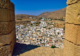 Village of Lindos seen from the Acropolis, Rhodes island GR - 687246642