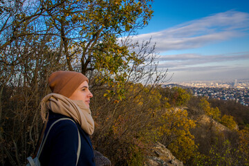 Young woman is hiking on the Devil s Peak hill above Budapest