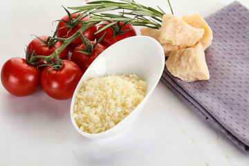 Shredded Italian hard parmesan cheese