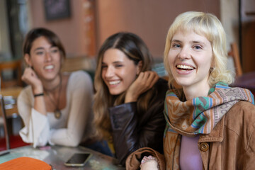 Joyful Female Friends at a Cafe