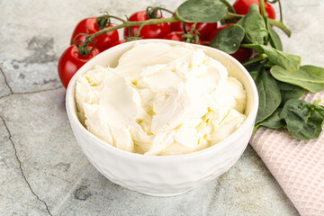 Soft cream cheese in the bowl