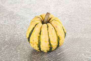 Ripe raw fresh decorative pumpkin