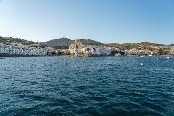 Fototapeta na wymiar city ​​landscape on the costa brava in summer with white houses and boats