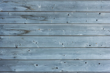 grey wood background. Wall made of logs