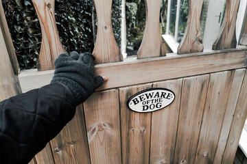 Person unknown seen attempting to gain access to a side gate of a private property. The beware of...