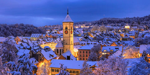 Panorama view of the old Swiss city of Schaffhausen town in winter with Christimas season illumination at dusk - Powered by Adobe