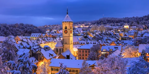 Fotobehang Panorama view of the old Swiss city of Schaffhausen town in winter with Christimas season illumination at dusk © Yü Lan