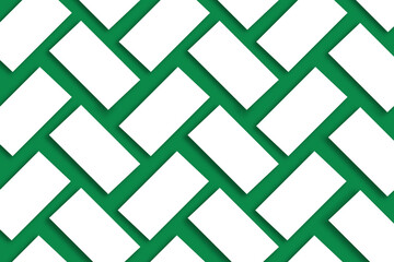 Mockup of stacks of white business cards arranged in rows on a green textured paper background.