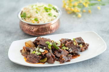 Delicious beef stir-fry with red and yellow bell peppers
