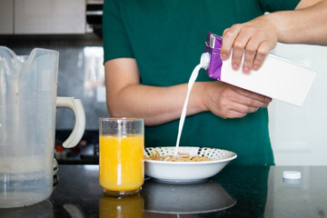 preparing cereal with milk