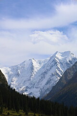 Fototapeta na wymiar Tenth stage of Ak-Suu Traverse trek with a view of Karakol peak and Aylanish glacier in Kyrgyzstan