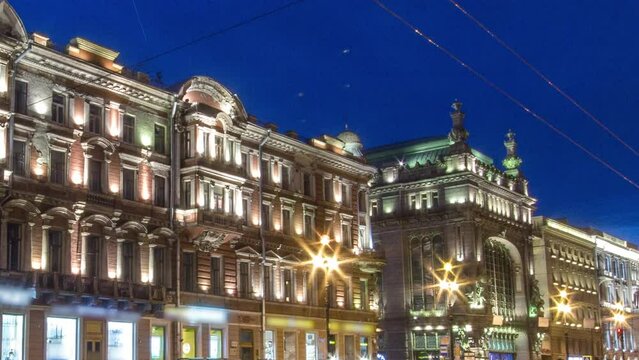 Night Traffic on Nevsky Prospekt avenue in St. Petersburg Timelapse. Dynamic Movement and Busy Road Scene. Illuminated historic buildings