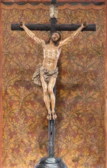 Tuinposter  VICENZA, ITALY - NOVEMBER 5, 2023: The carved polychrome Crucifixion in the Cahedral by unknown artist © Renáta Sedmáková