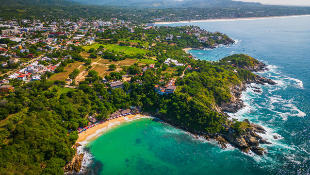 Puerto escondido Oaxaca Coastline aerial footage of sea ocean water waves in Mexico