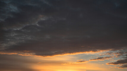 Fototapeta na wymiar Beautiful sky background - Sunset Sunrise sky with light clouds and real sun.
