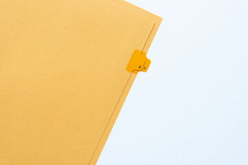 kraft paper dividers with the numbers six and seven tabs on plain paper