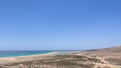 Photo sur Plexiglas Plage de Sotavento, Fuerteventura, Îles Canaries As the tide comes in, the lagoon fills at Sotavento Beach, Fuerteventura