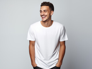 a young male model wearing a blank T shirt for use as mockup with blank background