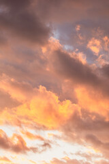 Golden, orange and blue clouds at sunset