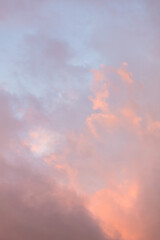 Golden, orange and blue clouds at sunset