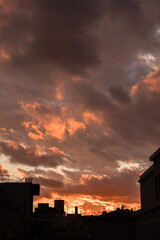 Golden, orange and blue clouds at sunset