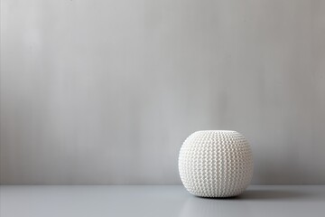 Minimalist White Knitted Pouf Beside Sofa with Copy Space - Modern Living Room Interior Design