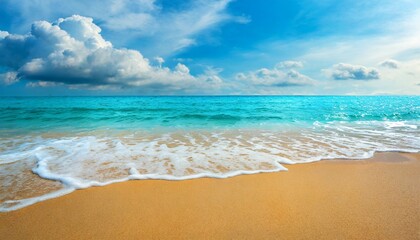 Fototapeta na wymiar soft blue ocean wave on clean sandy beach