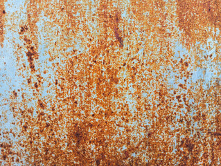 Abstract brown rusty grunge background. Weathered and rusty metallic board. Rusted metal plate texture with copy space.