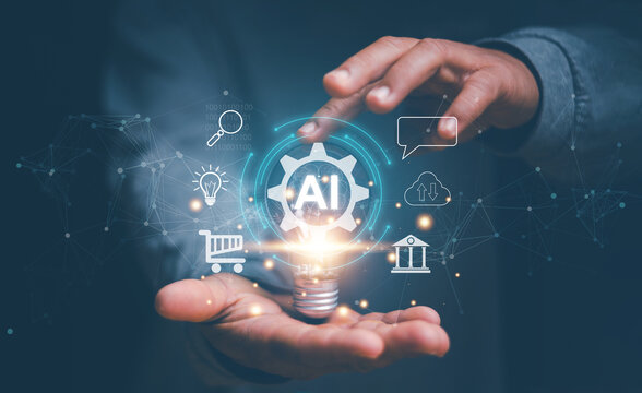 Artificial Intelligence of futuristic Innovative technology for business concept, Businessman holding lightbulb with icon of financial technology and business administration, Chat with AI.