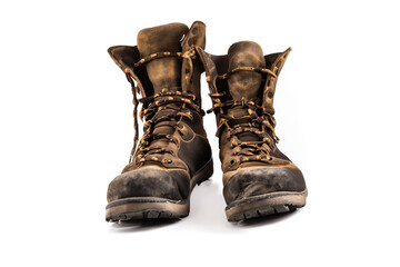 A pair of old leather hiking boots isolated on white background. - obrazy, fototapety, plakaty
