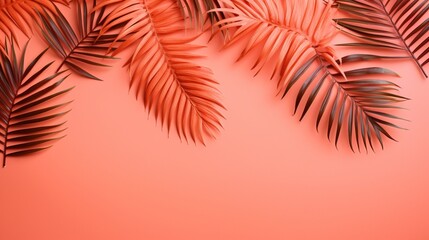 Tropical palm leaves arranged in a vibrant flat lay pattern on a coral-colored background