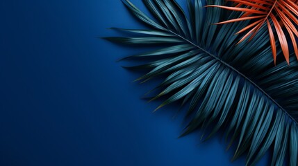 Fototapeta na wymiar Vibrant palm branches creating an artistic flat lay composition against a deep blue backdrop