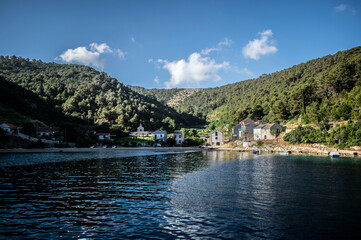 Fototapeta premium a bay and a small town against the background of mountains