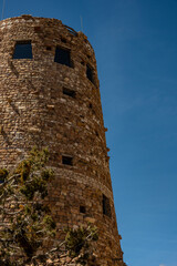 Obraz premium Desert Watchtower In Grand Canyon Against Blue Sky