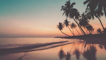 palm trees silhouettes on tropical beach at sunset modern vintage colors