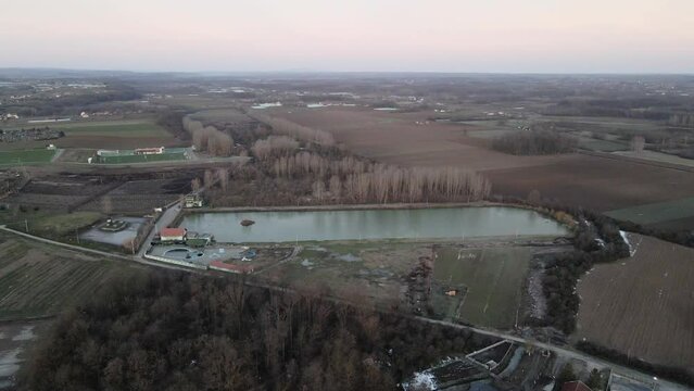 Drone shot of lake in countryside in sunrise in Ub, Serbia