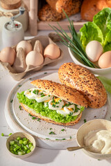 Fresh and tasty sandwich with eggs and mayonnaise. - obrazy, fototapety, plakaty