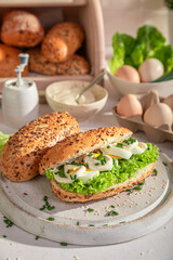 Healthy and delicious sandwich with mayonnaise and eggs. - obrazy, fototapety, plakaty