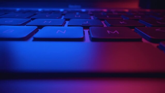 Close up of hands typing and coding on laptop keyboard. Digital innovation protection technology. Futuristic network server background. Blockchain crypto developer and binary program code concept